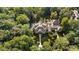Large home nestled in lush woods with a pool and patio at 3560 Ridgewood Nw Rd, Atlanta, GA 30327