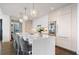 Modern kitchen with white cabinetry, large island, and high-end stainless steel appliances at 3107 Peachtree Ne Rd # 1101, Atlanta, GA 30305