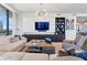 Sophisticated living room with sectional sofa, built-in media center, and modern decor at 3107 Peachtree Ne Rd # 1101, Atlanta, GA 30305
