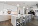 Gourmet kitchen with white and wood cabinetry, large island with seating, and high-end appliances at 3107 Peachtree Ne Rd # 1101, Atlanta, GA 30305