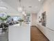 Modern kitchen with white and wood cabinetry, large island, and stainless steel appliances at 3107 Peachtree Ne Rd # 1101, Atlanta, GA 30305