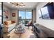 Bright sitting room with city views and comfortable seating at 3107 Peachtree Ne Rd # 1101, Atlanta, GA 30305