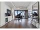 Living room with grand piano, wet bar and stunning city views at 3107 Peachtree Ne Rd # 1101, Atlanta, GA 30305