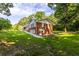 Brick ranch house with covered patio and large backyard at 4440 Stonewall Tell Rd, Atlanta, GA 30349