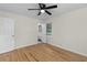 Bedroom with hardwood floor, ceiling fan and en-suite bath at 4440 Stonewall Tell Rd, Atlanta, GA 30349