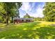 Brick ranch house with covered patio and large backyard at 4440 Stonewall Tell Rd, Atlanta, GA 30349