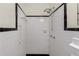 Retro-style shower with black and white tile at 4440 Stonewall Tell Rd, Atlanta, GA 30349