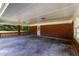 Covered carport with brick and concrete flooring at 4440 Stonewall Tell Rd, Atlanta, GA 30349