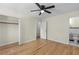 Bedroom with hardwood floors, double closet and en-suite bath at 4440 Stonewall Tell Rd, Atlanta, GA 30349