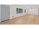 Bright living room with hardwood floors and large windows at 4440 Stonewall Tell Rd, Atlanta, GA 30349