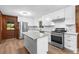 Modern kitchen featuring white cabinets and granite countertops at 4440 Stonewall Tell Rd, Atlanta, GA 30349