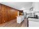 Modern kitchen with white cabinets and granite countertops at 4440 Stonewall Tell Rd, Atlanta, GA 30349