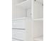 Bright white custom closet with shelves and drawers at 1261 Lavista Rd # F-3, Atlanta, GA 30324