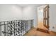 Elegant entryway with ornate railing and view of hardwood floors at 1261 Lavista Rd # F-3, Atlanta, GA 30324
