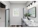 Modern bathroom with granite countertops and walk-in shower at 12 Ivy Chase Nw Way, Cartersville, GA 30121