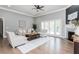 Spacious living room with hardwood floors, fireplace, and access to backyard at 12 Ivy Chase Nw Way, Cartersville, GA 30121