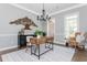 Spacious dining room with hardwood floors, chandelier, and comfortable seating at 12 Ivy Chase Nw Way, Cartersville, GA 30121