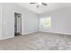 Bright bedroom with carpet flooring, ceiling fan and window at 12 Ivy Chase Nw Way, Cartersville, GA 30121