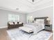 Spacious main bedroom with sitting area and hardwood floors at 12 Ivy Chase Nw Way, Cartersville, GA 30121
