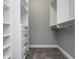 Spacious walk-in closet with ample shelving and hanging space at 12 Ivy Chase Nw Way, Cartersville, GA 30121