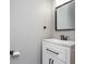 Small bathroom with single vanity and black hardware at 12 Ivy Chase Nw Way, Cartersville, GA 30121