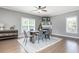 Bright dining room with hardwood floors and a farmhouse style table at 12 Ivy Chase Nw Way, Cartersville, GA 30121