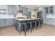 Modern kitchen with gray cabinets, granite countertops and island seating at 12 Ivy Chase Nw Way, Cartersville, GA 30121