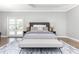Main bedroom with plush carpet and French doors to backyard at 12 Ivy Chase Nw Way, Cartersville, GA 30121