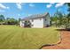 Landscaped backyard with a beautiful lawn and fence at 12 Ivy Chase Nw Way, Cartersville, GA 30121