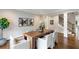 Elegant dining room with hardwood floors and a modern table at 1095 Mockingbird Ln, Cumming, GA 30041