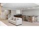 Finished basement with wet bar and comfortable seating at 1095 Mockingbird Ln, Cumming, GA 30041