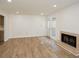 Bright living room featuring a fireplace and wood-look floors at 1666 Paddlewheel Dr, Marietta, GA 30062