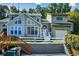 Two-story townhome with a landscaped yard and attached garage at 1666 Paddlewheel Dr, Marietta, GA 30062