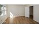 Bright bedroom with wood-look floors and closet at 1666 Paddlewheel Dr, Marietta, GA 30062