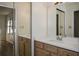 Bathroom with vanity, sink, and large mirror at 1666 Paddlewheel Dr, Marietta, GA 30062