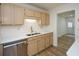Kitchen with stainless steel appliances and light beige cabinets at 1666 Paddlewheel Dr, Marietta, GA 30062