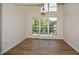 Bright dining room with hardwood floors and large windows offering natural light at 1666 Paddlewheel Dr, Marietta, GA 30062
