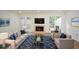 Living room with fireplace, two sofas, and access to backyard at 1666 Paddlewheel Dr, Marietta, GA 30062