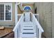 White front steps leading to the home's entrance at 1666 Paddlewheel Dr, Marietta, GA 30062