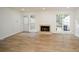 Living room features hardwood floors, fireplace and sliding glass door to patio at 1666 Paddlewheel Dr, Marietta, GA 30062