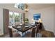 Elegant dining room with dark wood table, chandelier, and large windows at 1666 Paddlewheel Dr, Marietta, GA 30062