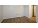 Simple bedroom with wood-look floors and mirrored closet at 1666 Paddlewheel Dr, Marietta, GA 30062
