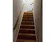 Wooden staircase leading to the upper levels of the home at 6209 Southland Forest Dr, Stone Mountain, GA 30087