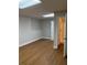 Finished basement bedroom with laminate flooring at 6209 Southland Forest Dr, Stone Mountain, GA 30087