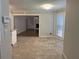 Dining area with tile floor and view of living room at 6209 Southland Forest Dr, Stone Mountain, GA 30087