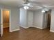 Main bedroom with hardwood floors, two closets and ceiling fans at 6209 Southland Forest Dr, Stone Mountain, GA 30087