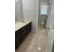 Bathroom with dark vanity and tile flooring at 6209 Southland Forest Dr, Stone Mountain, GA 30087