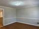 Dining room with hardwood floors and neutral walls at 6209 Southland Forest Dr, Stone Mountain, GA 30087