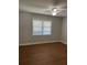 Spacious bedroom with hardwood floors and ceiling fan at 6209 Southland Forest Dr, Stone Mountain, GA 30087