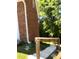 Side yard with steps leading to the deck at 6209 Southland Forest Dr, Stone Mountain, GA 30087